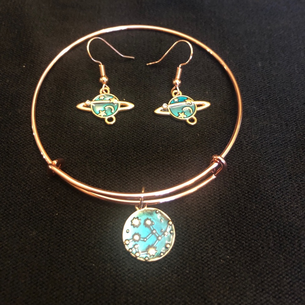 Rose gold adjustable bracelet and matching Saturn earrings